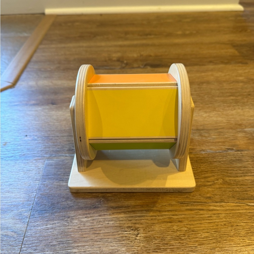 Vibrant Wooden Rotating Drum by LOVEVERY